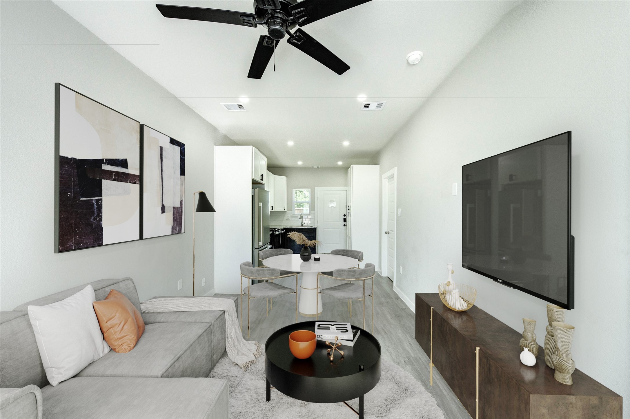 8157 Tate Street, Unit A Houston, TX 77028 - Photo 3 of 29 a living room with furniture and a flat screen tv