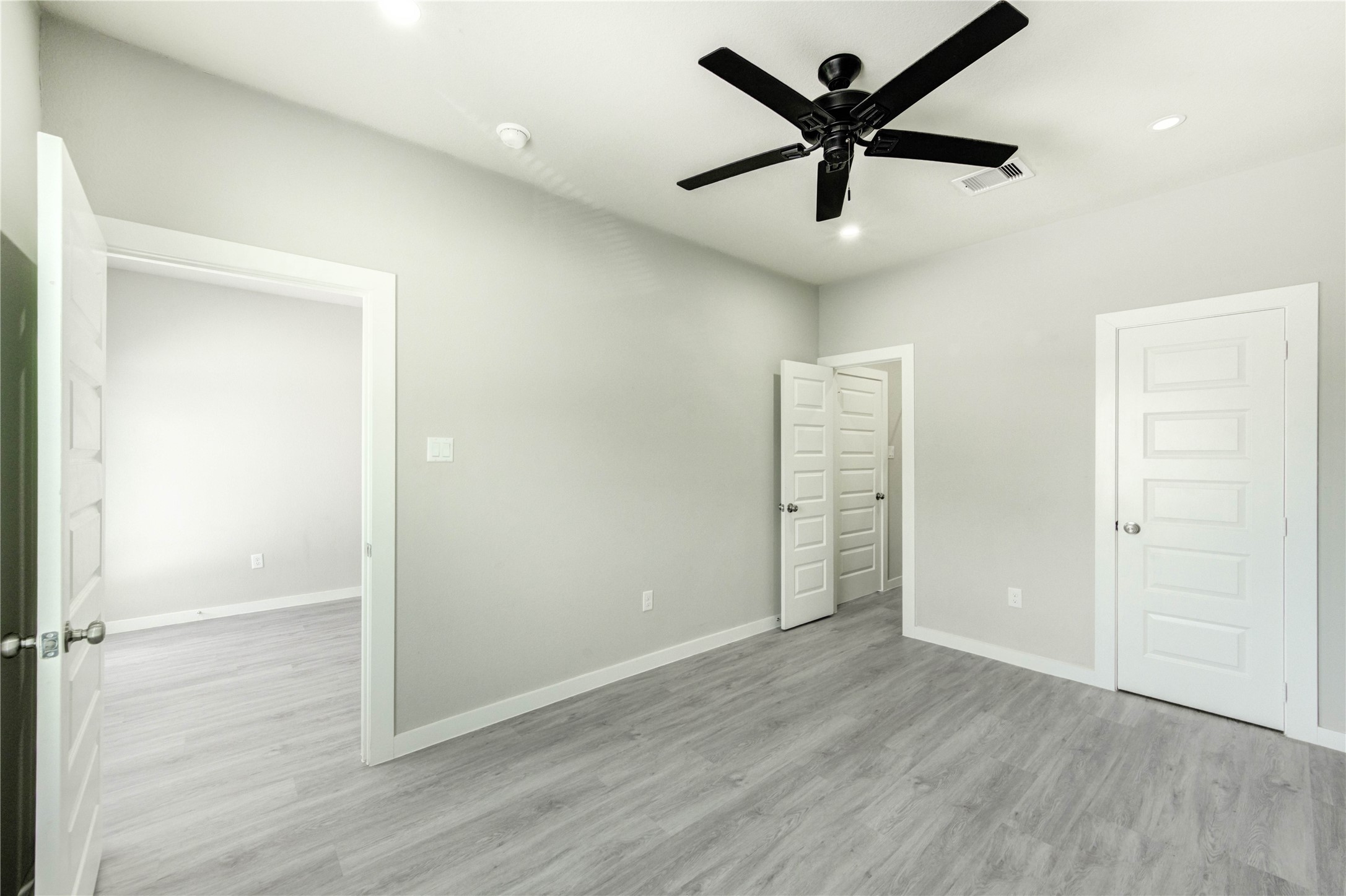 8157 Tate Street, Unit A Houston, TX 77028 - Photo 9 of 29 wooden floor in an empty room