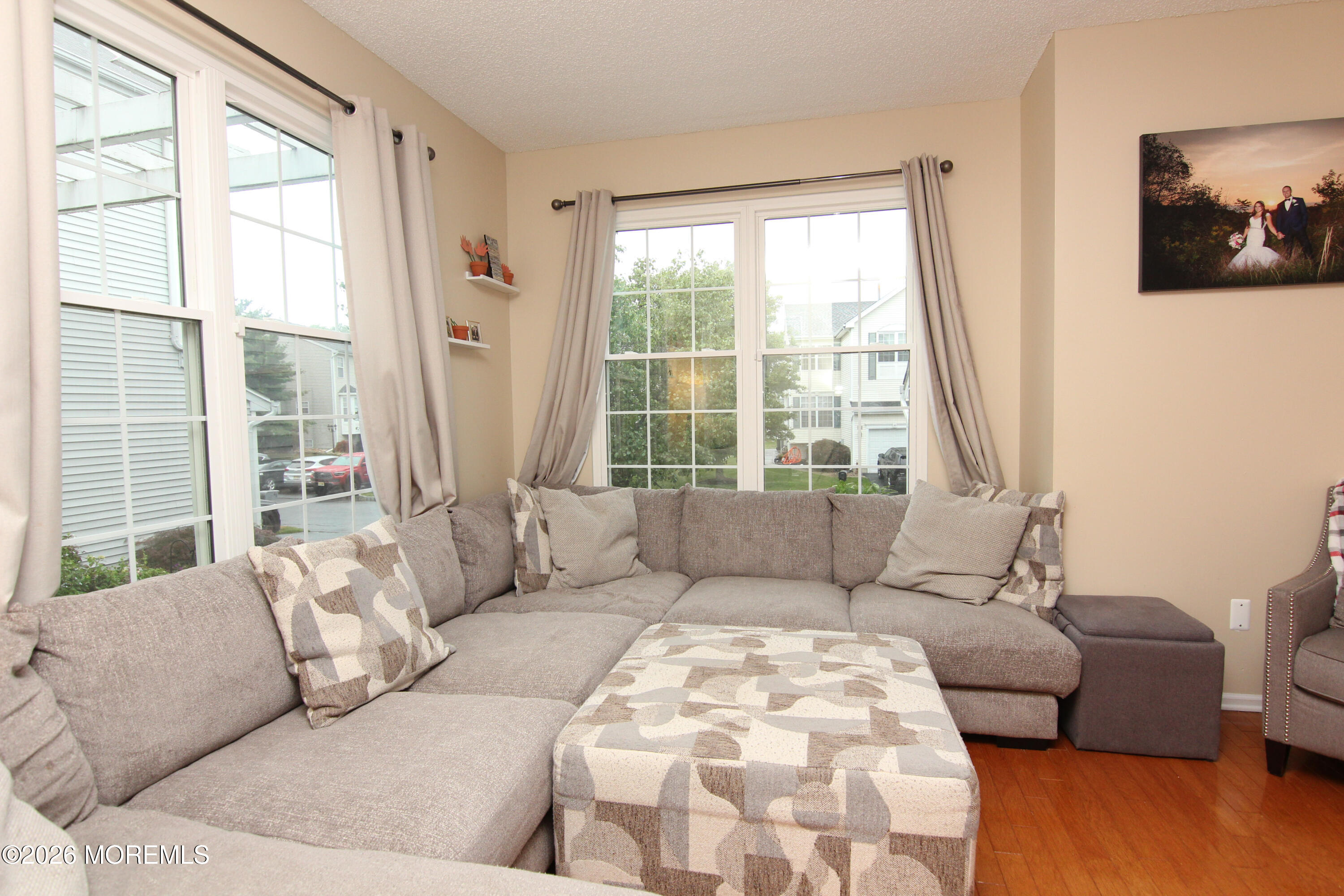 33 Austin Street Tinton Falls, NJ 07712 - Photo 7 of 46 a living room with furniture and a large window