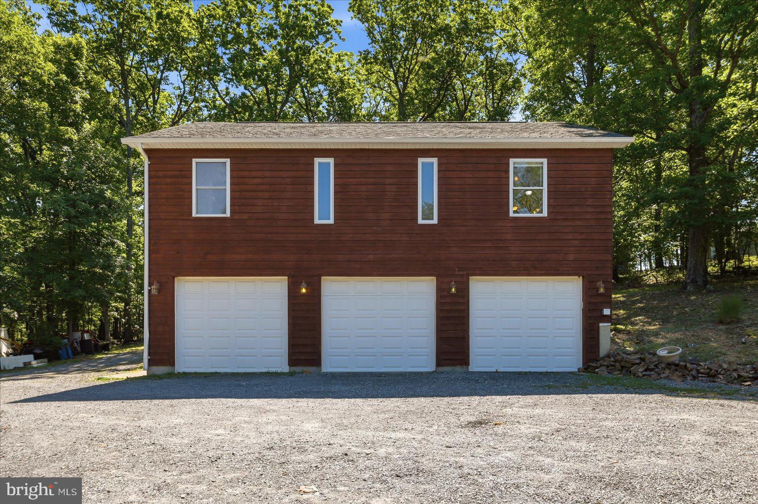 323 South Timber Ridge Road Cross Junction, VA 22625 - Photo 60 of 109 Charming garage with scenic backdrop.