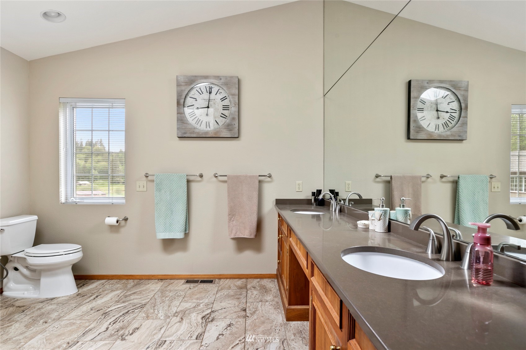 300 West Elk Ridge Road Shelton, WA 98584 - Photo 21 of 40 a bathroom with a granite countertop sink and a mirror
