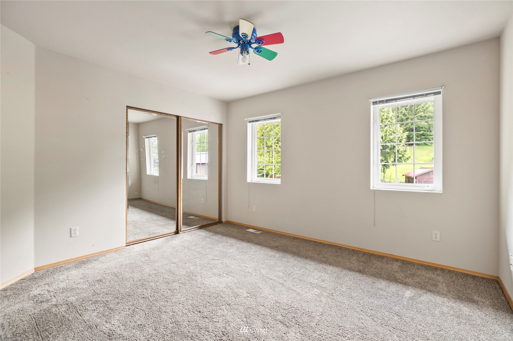 300 West Elk Ridge Road Shelton, WA 98584 - Photo 22 of 40 wooden floor in an empty room with a window