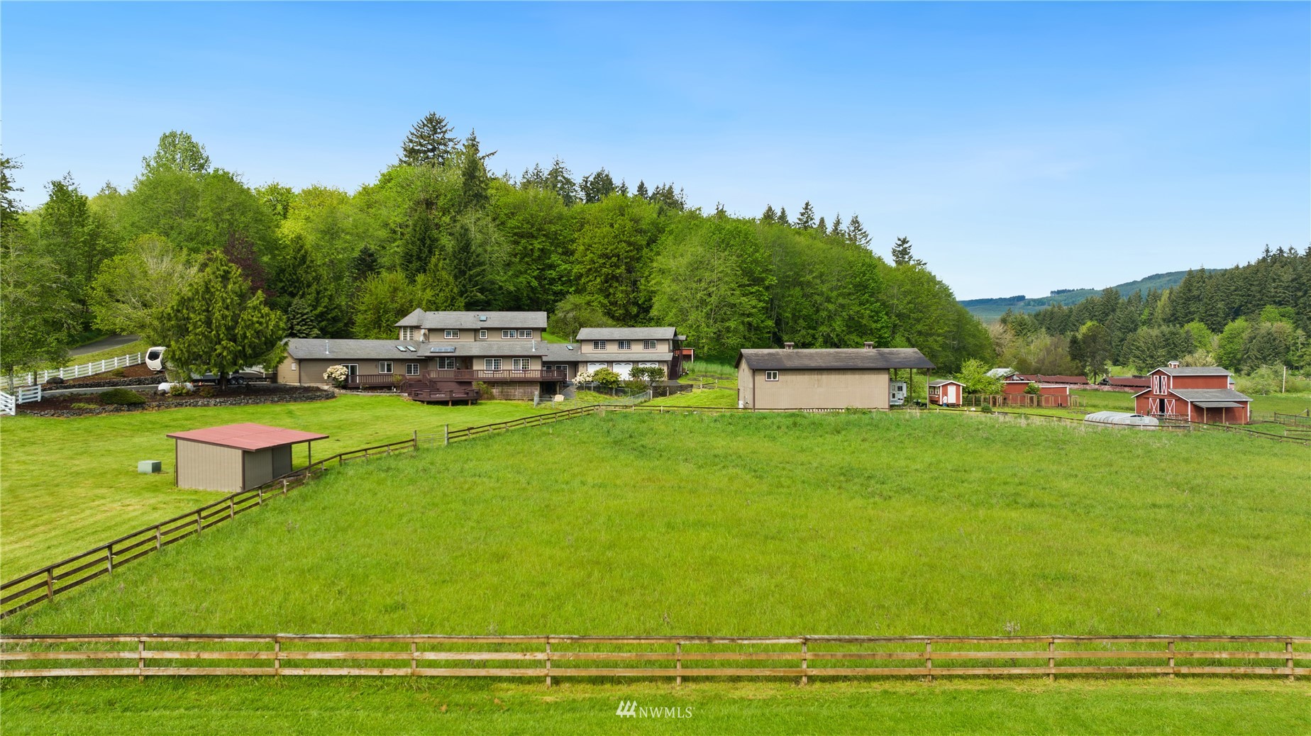 300 West Elk Ridge Road Shelton, WA 98584 - Photo 4 of 40 a view of a house with a big yard