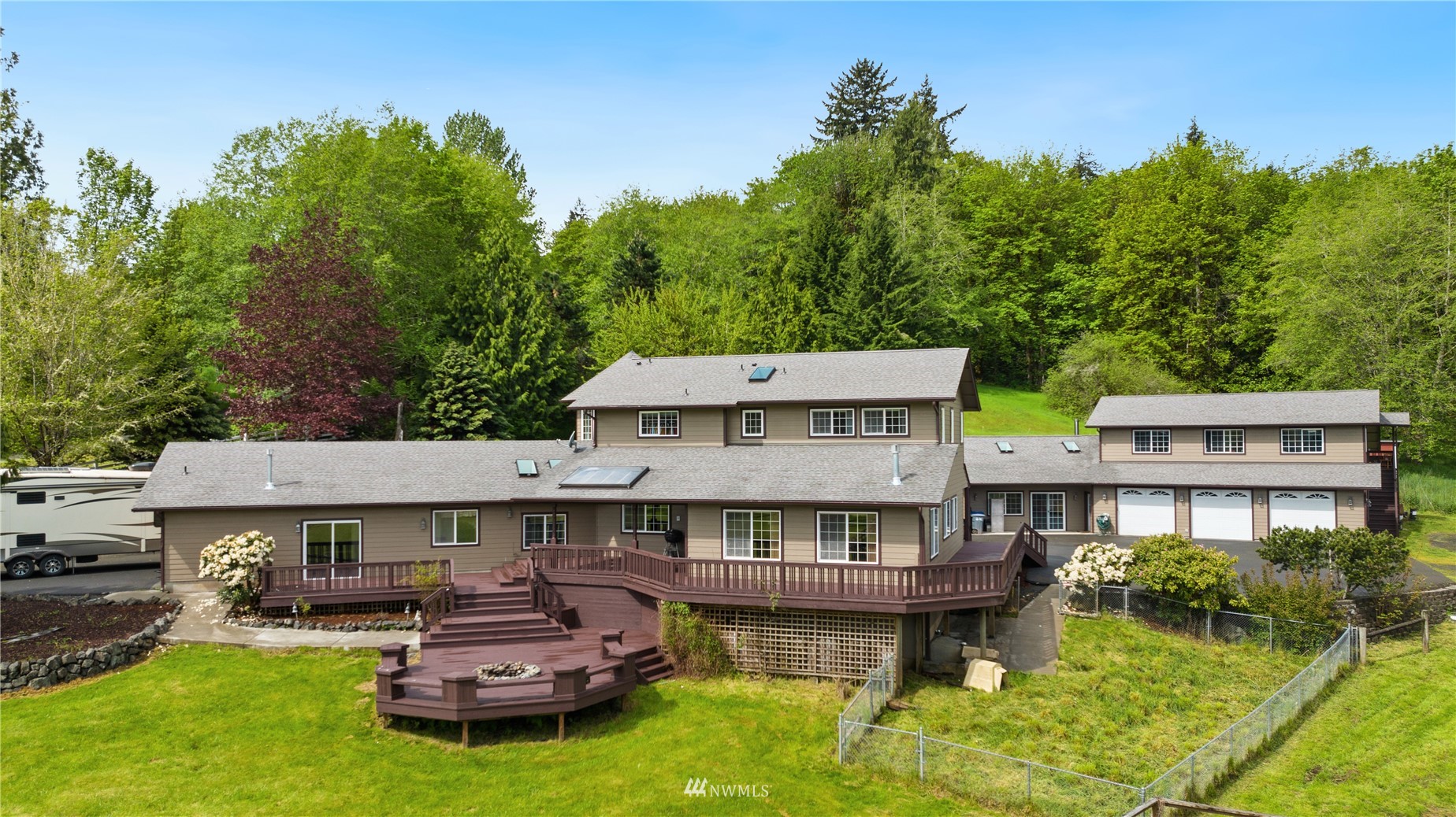 300 West Elk Ridge Road Shelton, WA 98584 - Photo 5 of 40 a aerial view of a house with swimming pool and sitting area