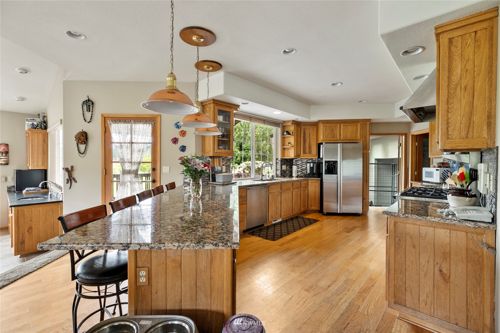300 West Elk Ridge Road Shelton, WA 98584 - Photo 10 of 40 a view of a living room and kitchen