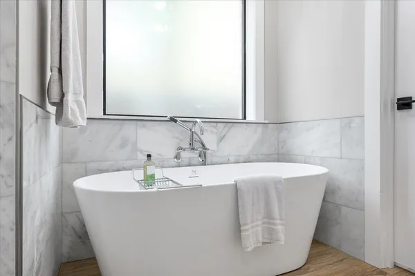 a view of a bathtub in a bathroom