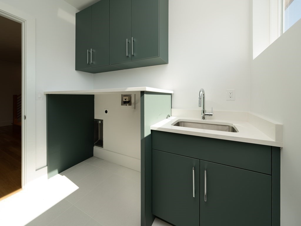 21 Cavanaugh Path Newton, MA 02459 - Photo 20 of 30 a bathroom with a sink and a mirror