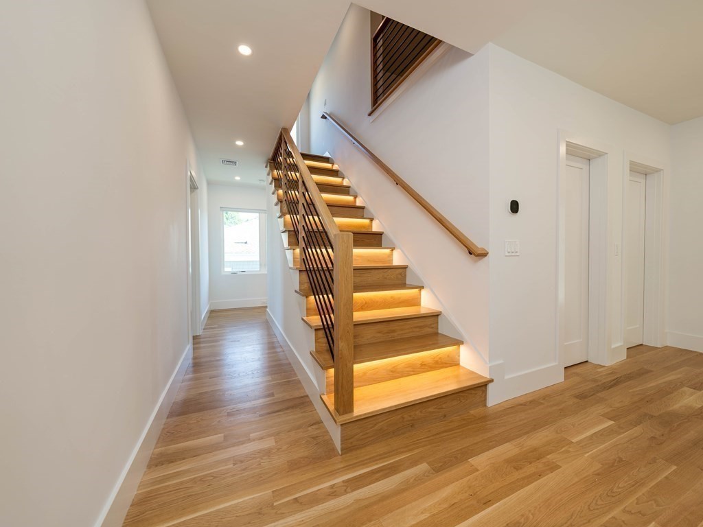 21 Cavanaugh Path Newton, MA 02459 - Photo 21 of 30 a view of entryway and hall with wooden floor