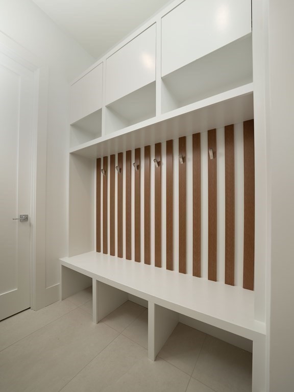 21 Cavanaugh Path Newton, MA 02459 - Photo 28 of 30 a white bench in a room