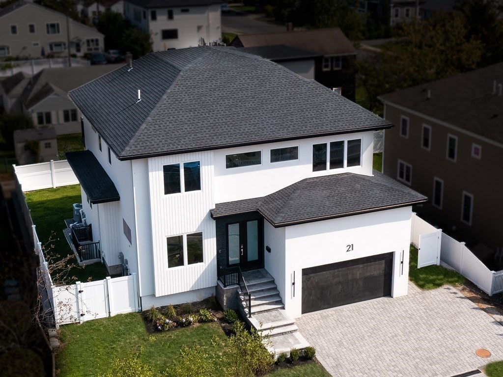21 Cavanaugh Path Newton, MA 02459 - Photo 29 of 30 a aerial view of a house with yard porch and outdoor seating