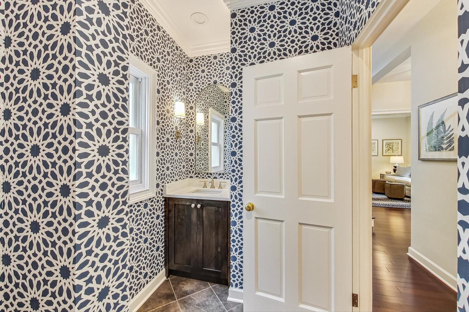 1701 Walnut Avenue Wilmette, IL 60091 - Photo 11 of 30 a bathroom with a sink and a shower