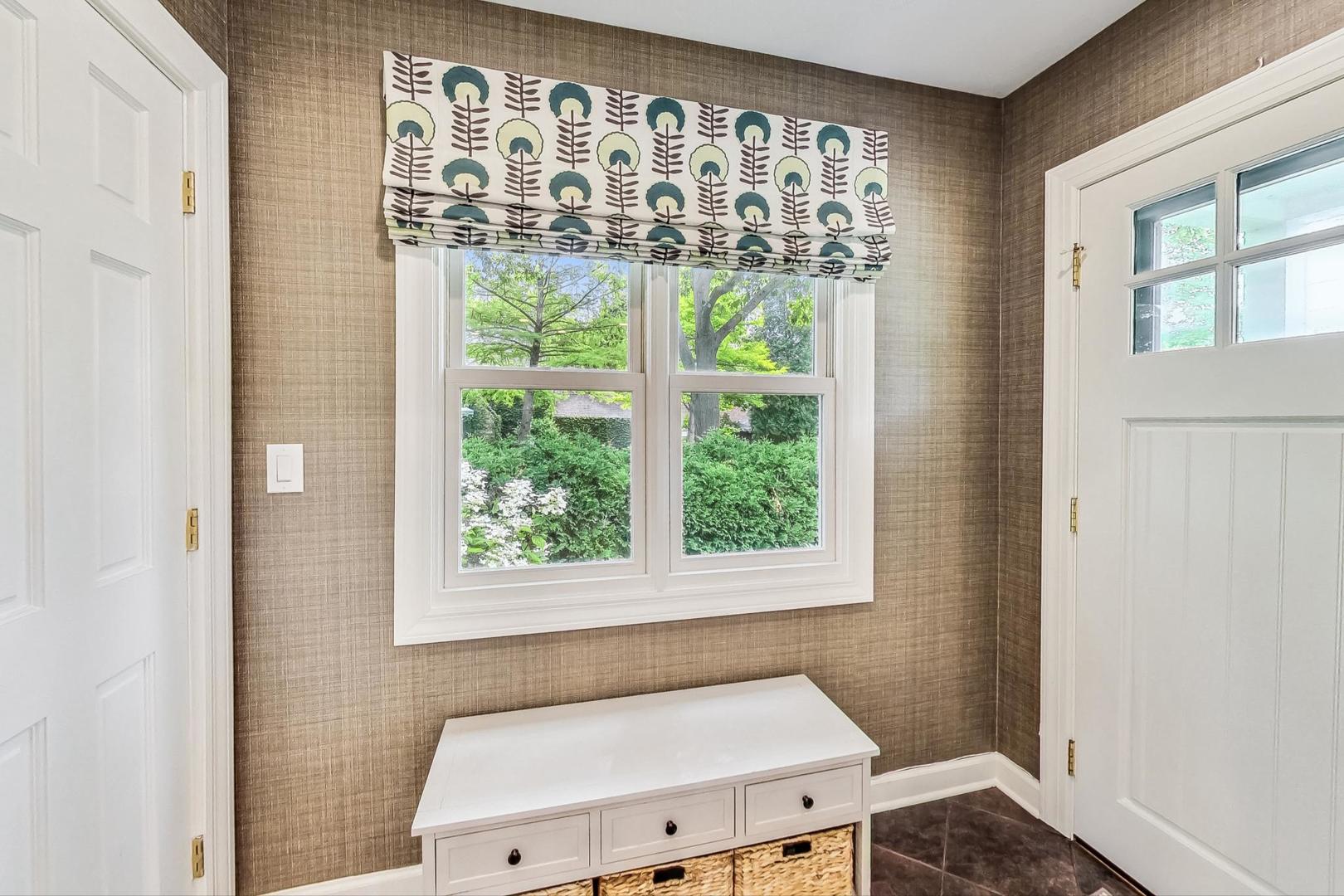 1701 Walnut Avenue Wilmette, IL 60091 - Photo 12 of 30 a bathroom with a bathtub and a shower