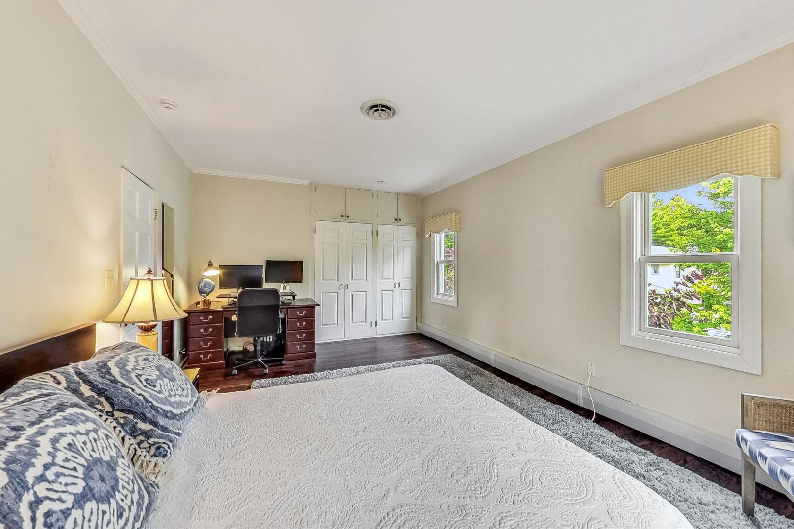 1701 Walnut Avenue Wilmette, IL 60091 - Photo 19 of 30 a bed room with furniture and a window