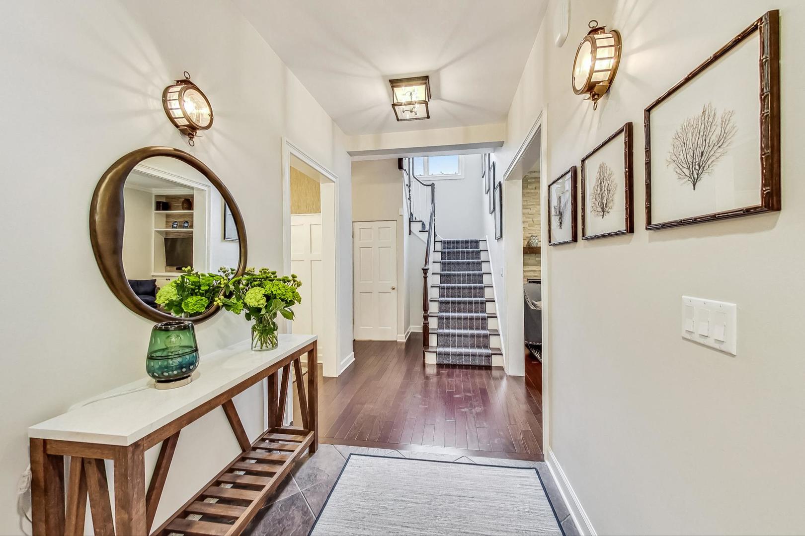 1701 Walnut Avenue Wilmette, IL 60091 - Photo 2 of 30 a view of an entryway with wooden floor
