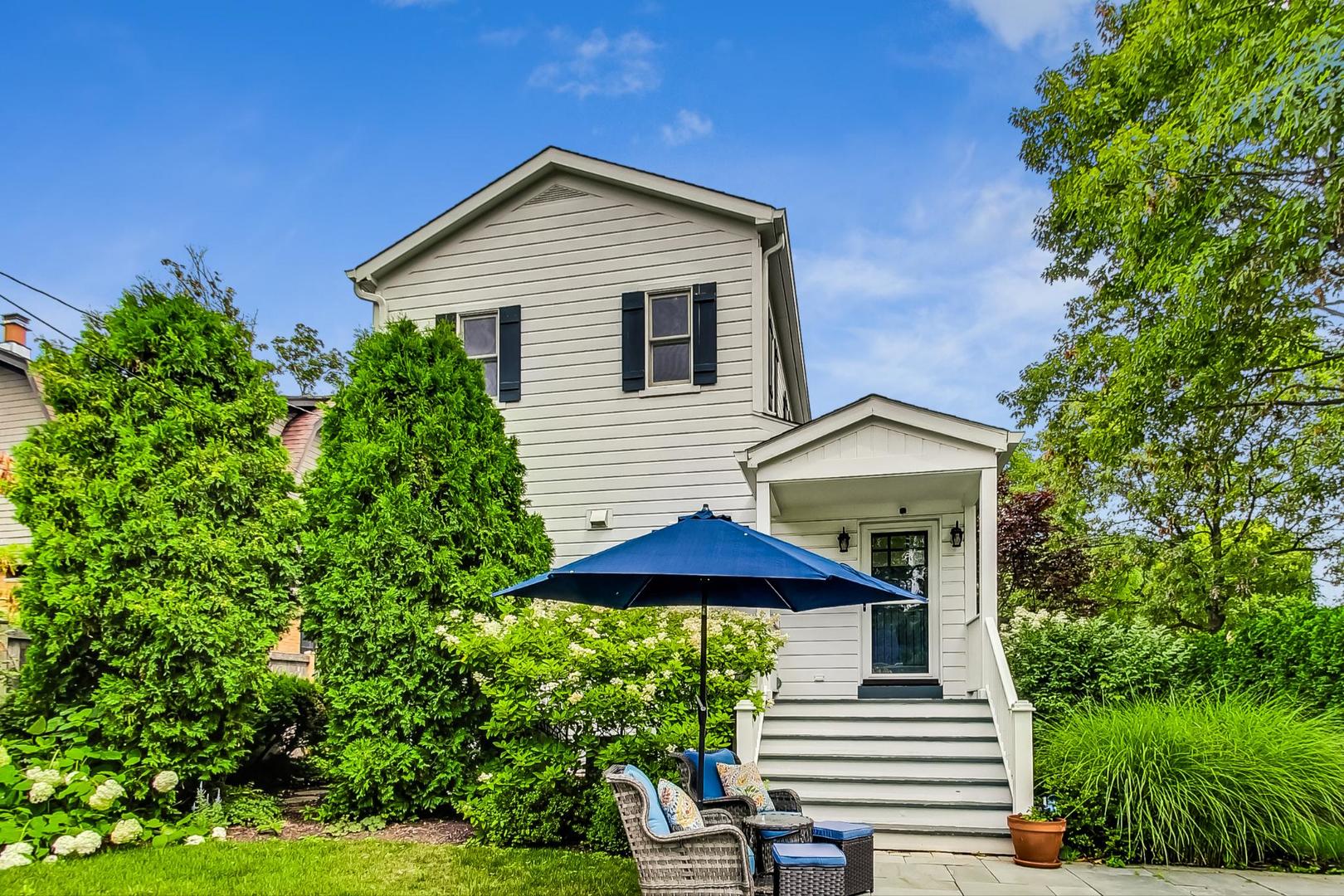 1701 Walnut Avenue Wilmette, IL 60091 - Photo 27 of 30 a front view of a house with a yard