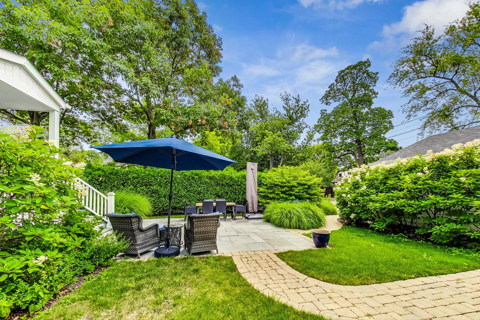 1701 Walnut Avenue Wilmette, IL 60091 - Photo 29 of 30 a view of a backyard with sitting area