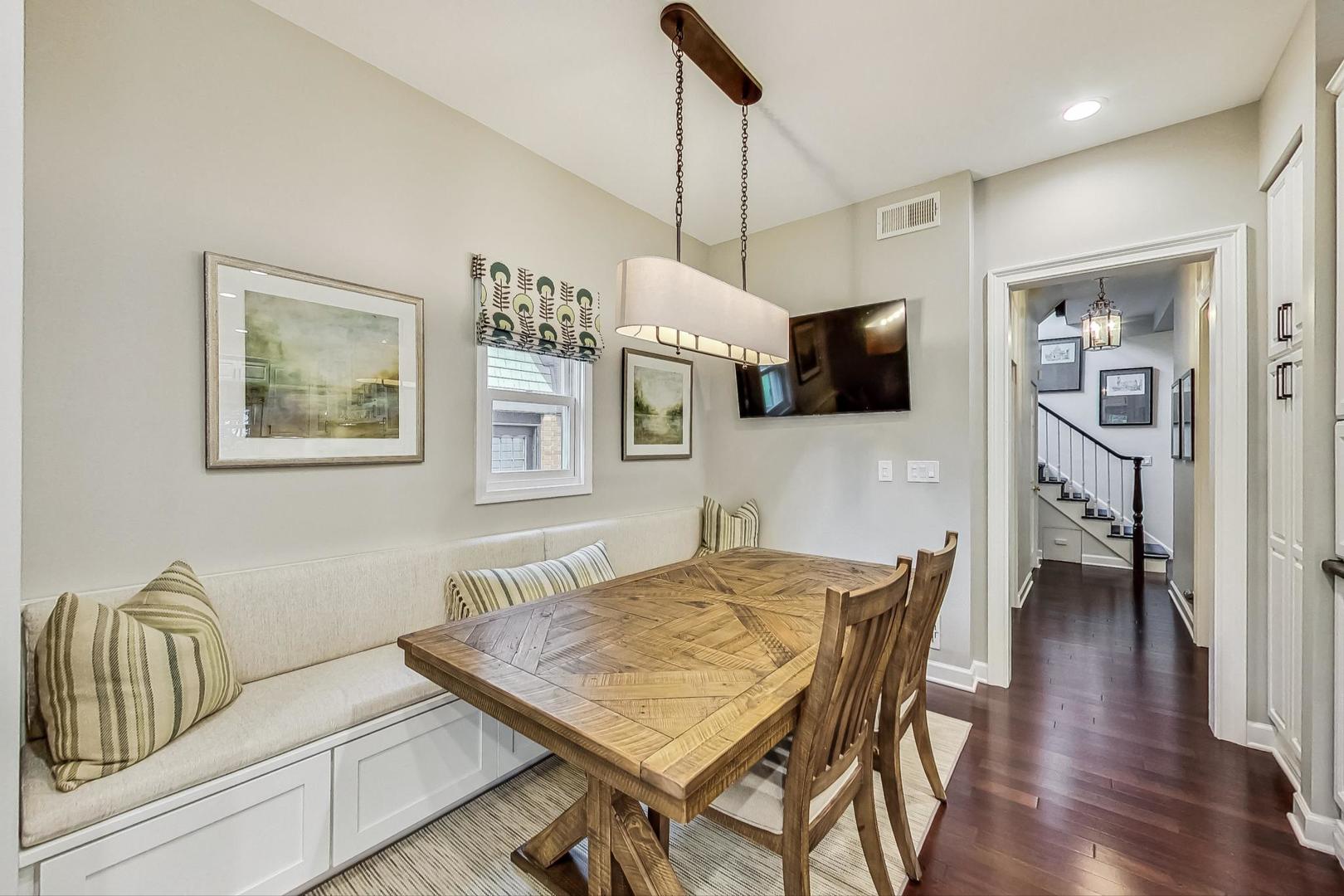 1701 Walnut Avenue Wilmette, IL 60091 - Photo 10 of 30 a living room with furniture and a flat screen tv