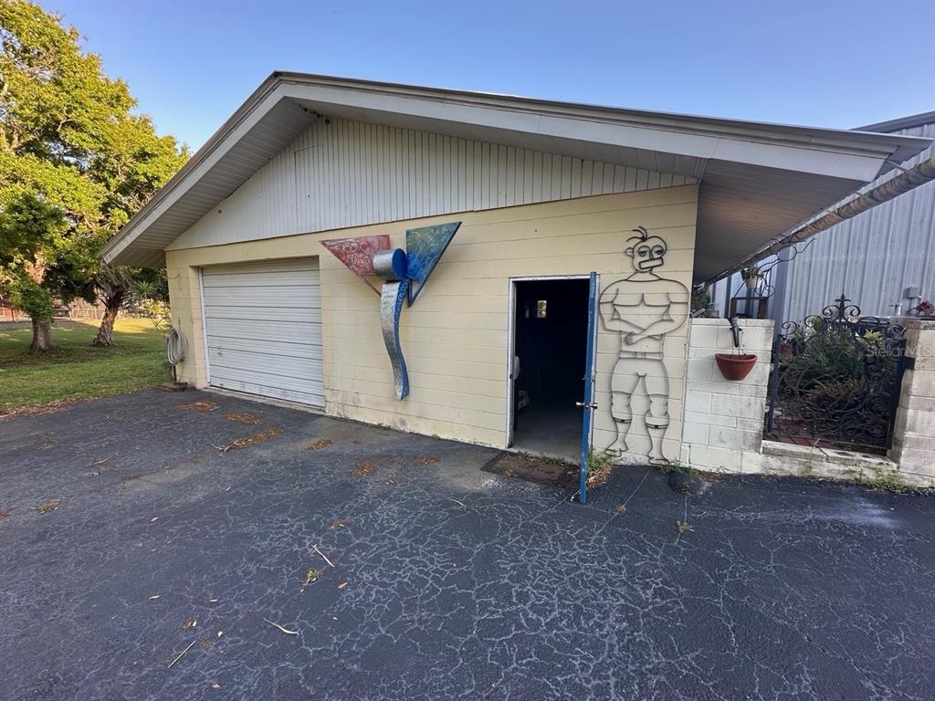 7036 Clark Road Sarasota, FL 34241 - Photo 1 of 1 2nd outbuilding with garage and workshops