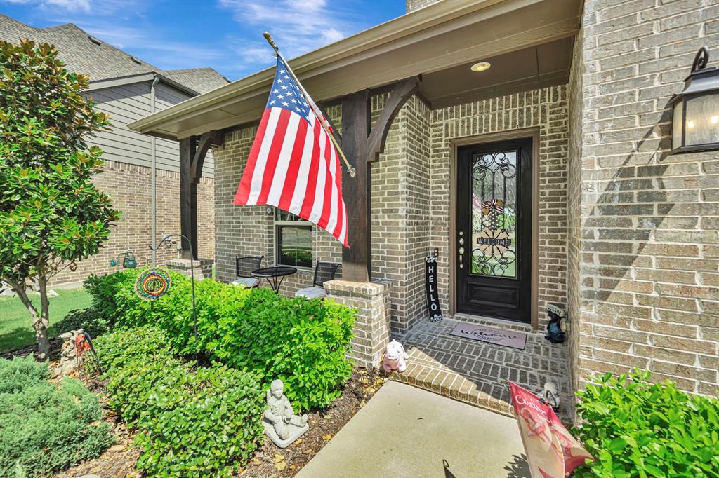 11305 Misty Ridge Drive Flower Mound, TX 76262 - Photo 4 of 40 Covered front porch.