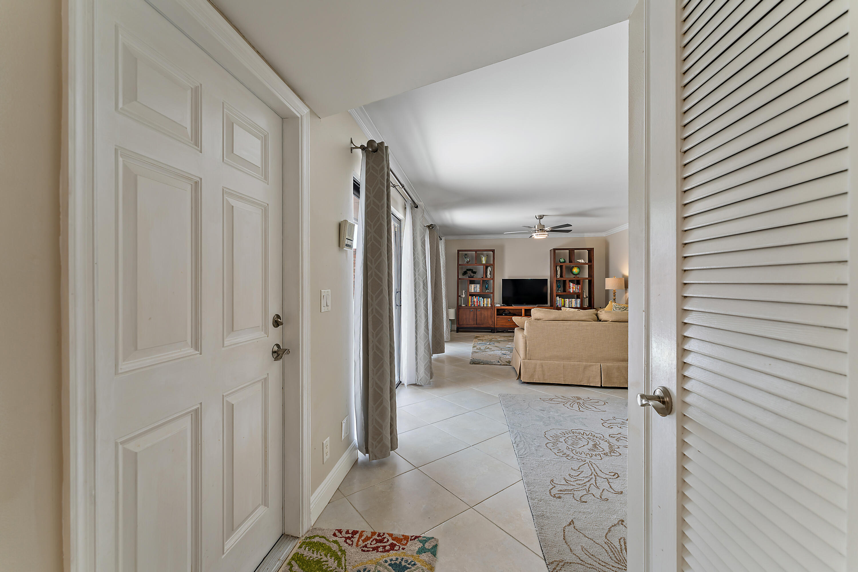 1420 Ocean Way, Unit 14C Jupiter, FL 33477 - Photo 8 of 41 a view of a living room with furniture