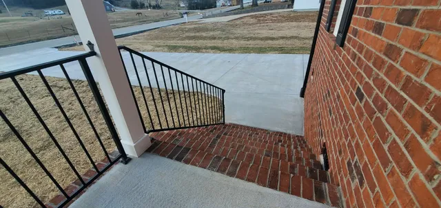 a bathroom with double sink and a mirror