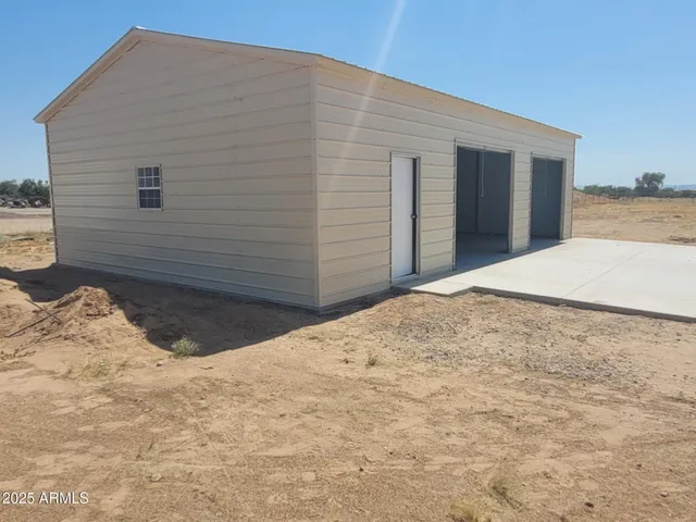 a view of a backyard of a house