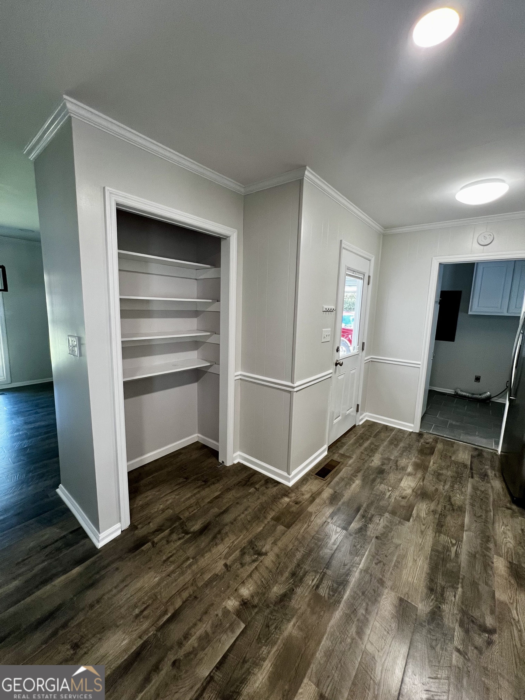 203 Smithfield Road Dublin, GA 31021 - Photo 13 of 44 a view of a room with wooden floor