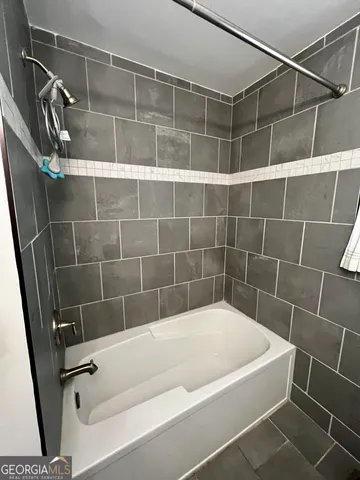 a bathroom with a bathtub