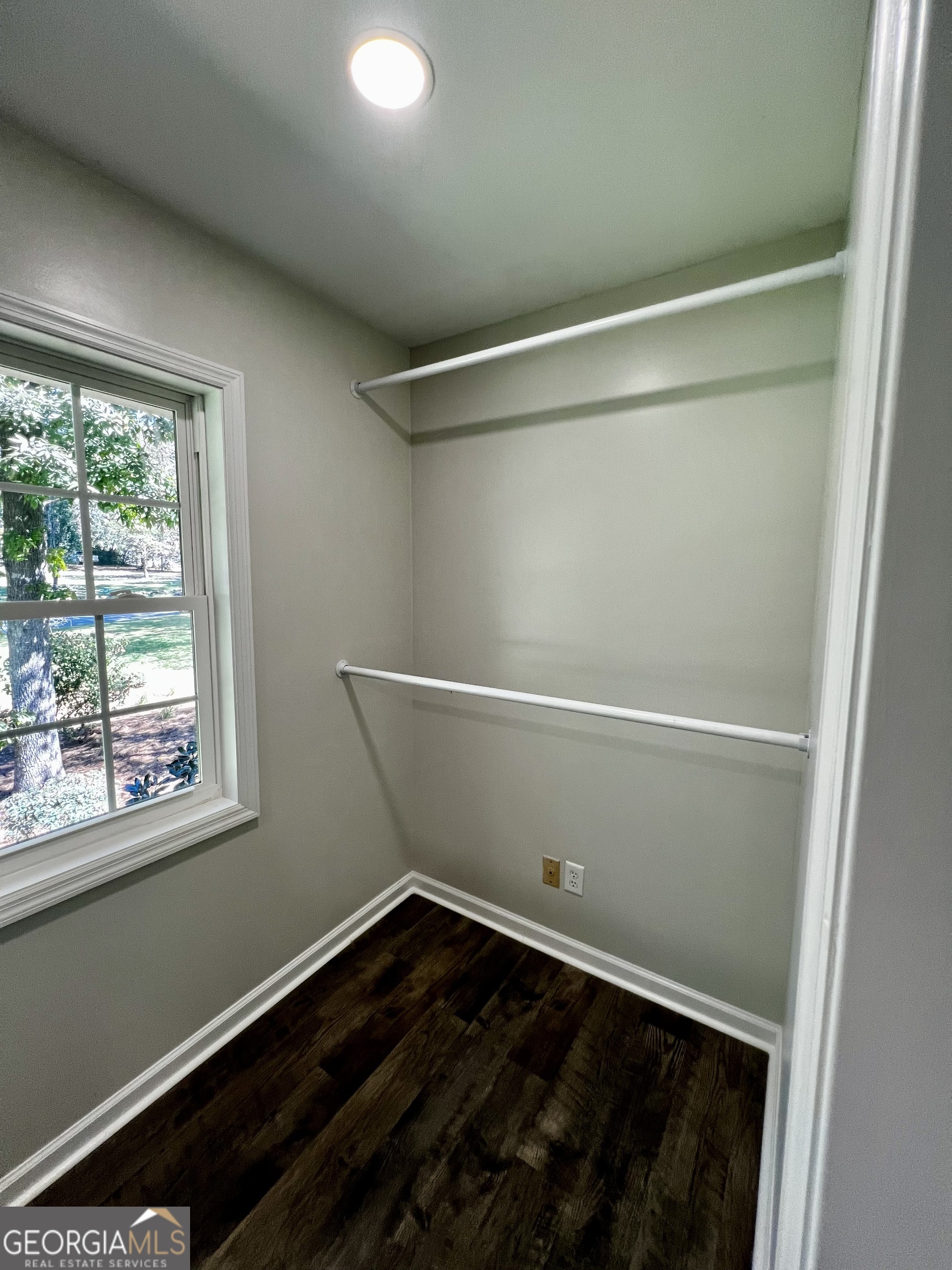 203 Smithfield Road Dublin, GA 31021 - Photo 24 of 44 a view of a room with wooden floor and window