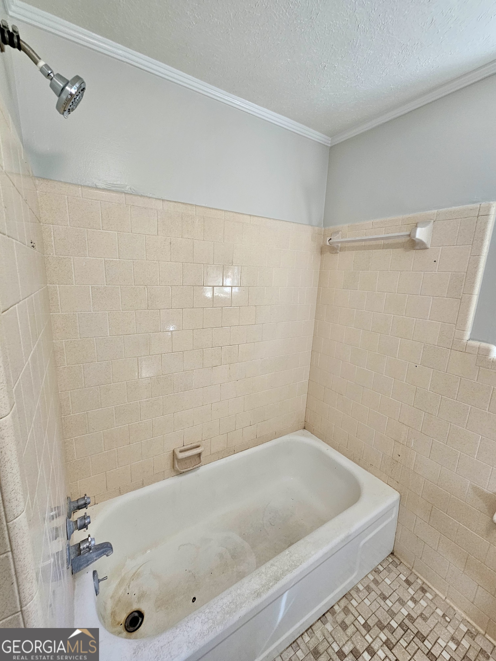 203 Smithfield Road Dublin, GA 31021 - Photo 30 of 44 a bathroom with a tub a sink and a shower