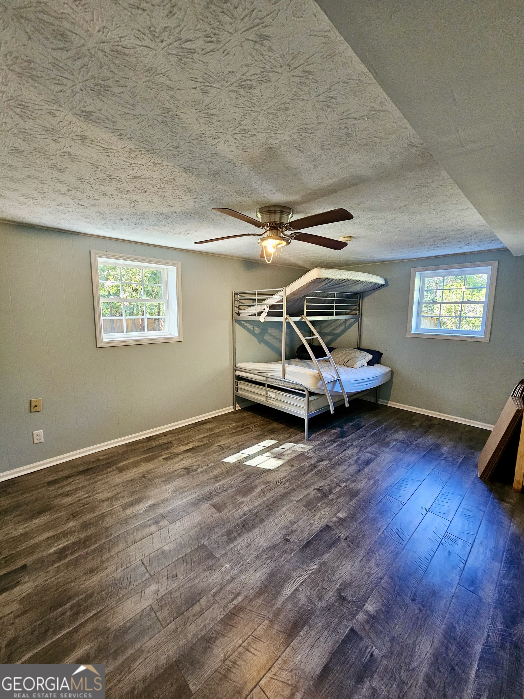 203 Smithfield Road Dublin, GA 31021 - Photo 31 of 44 a car park with wooden floor