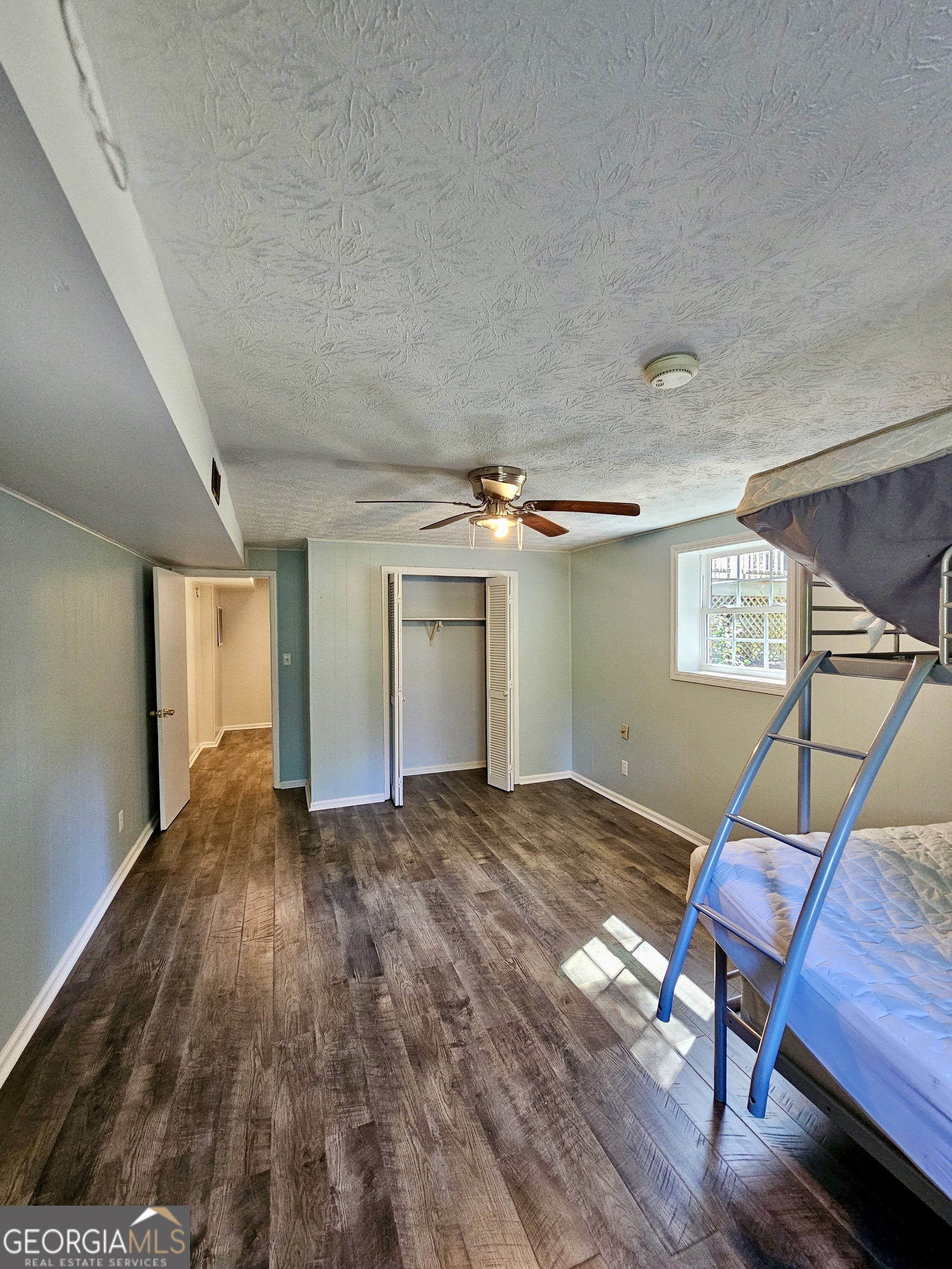 203 Smithfield Road Dublin, GA 31021 - Photo 32 of 44 a view of an empty room and wooden floor