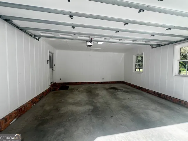 a view of outdoor space with wooden walls