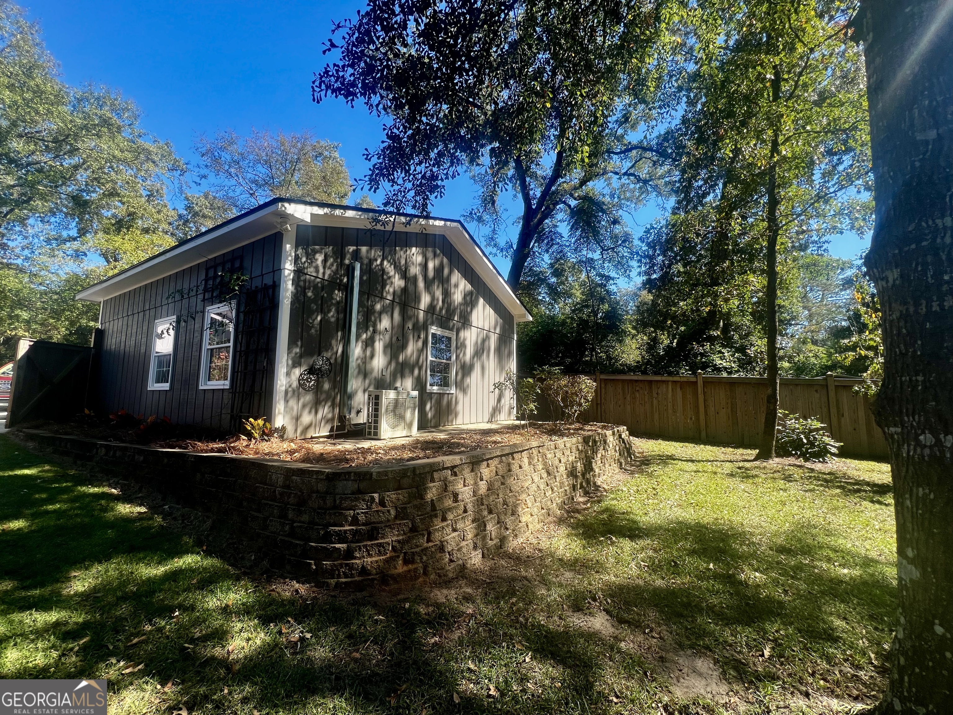 203 Smithfield Road Dublin, GA 31021 - Photo 40 of 44 a view of backyard with swimming pool