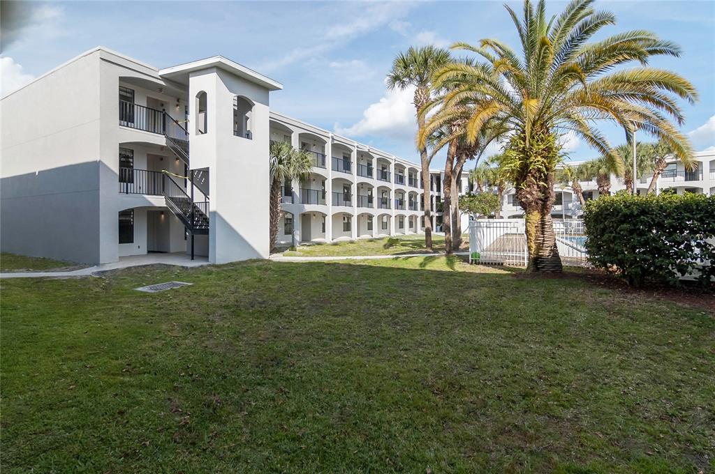 2323 McCoy Road, Unit 711 Orlando, FL 32809 - Photo 14 of 14 a house view with garden space