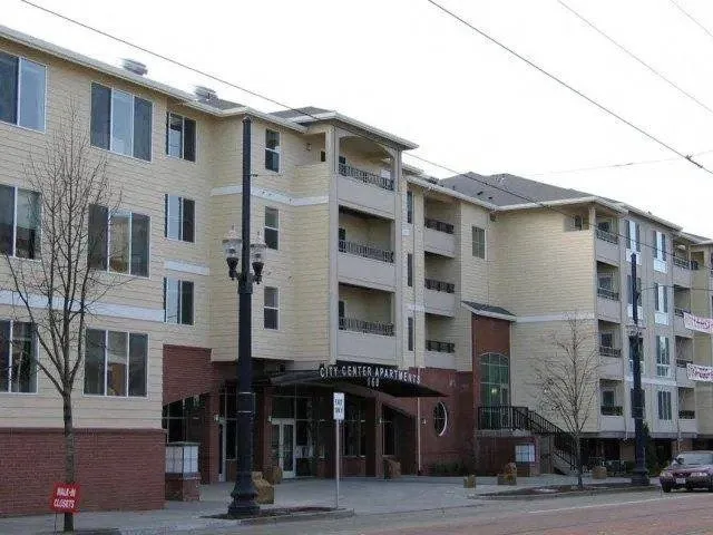 a front view of a building with glass windows