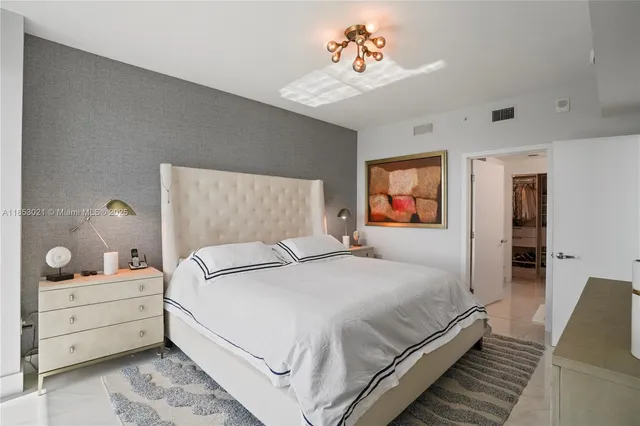 a bathroom with a double vanity sink mirror and double