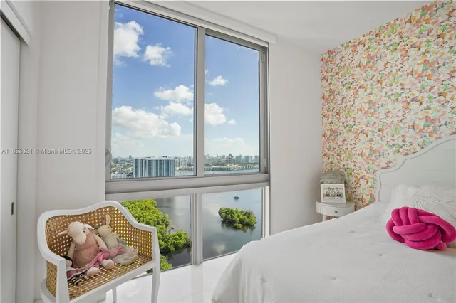 a terrace with outdoor seating and city view