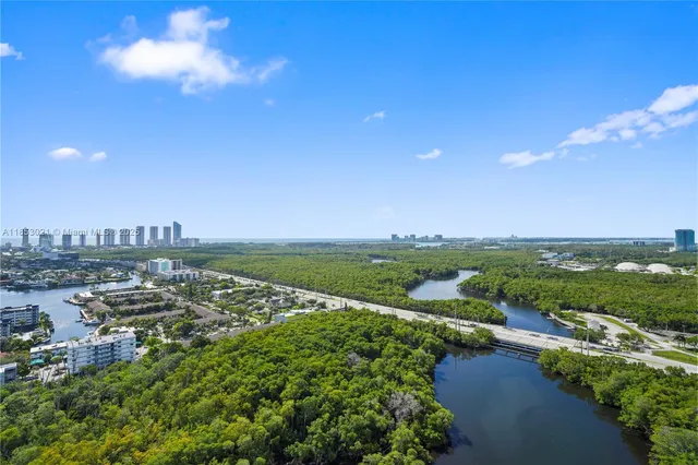 an aerial view of a house with a garden