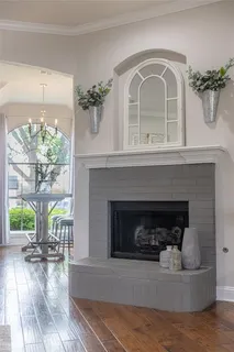 a view of a room with furniture window and wooden floor