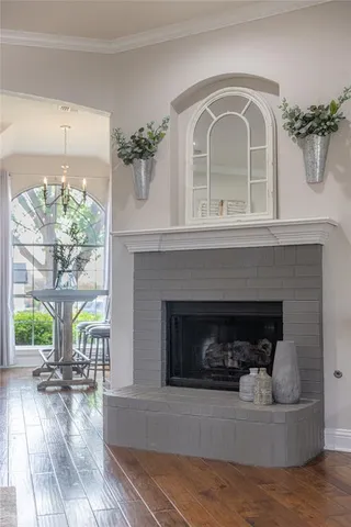 a view of a room with furniture window and wooden floor