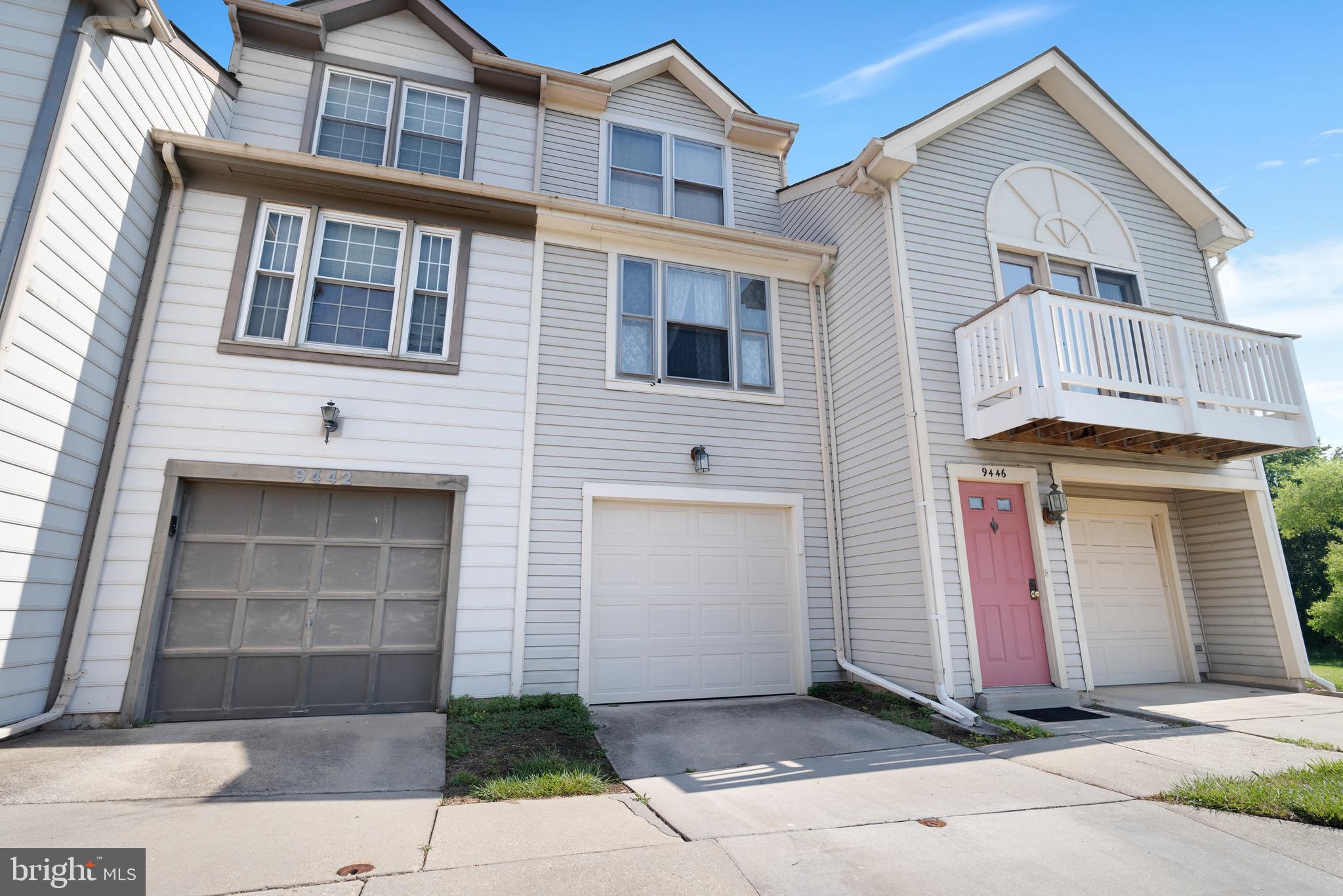 9448 Trevino Terrace, Unit 96 Laurel, MD 20708 - Photo 1 of 38 a front view of a house with a garage