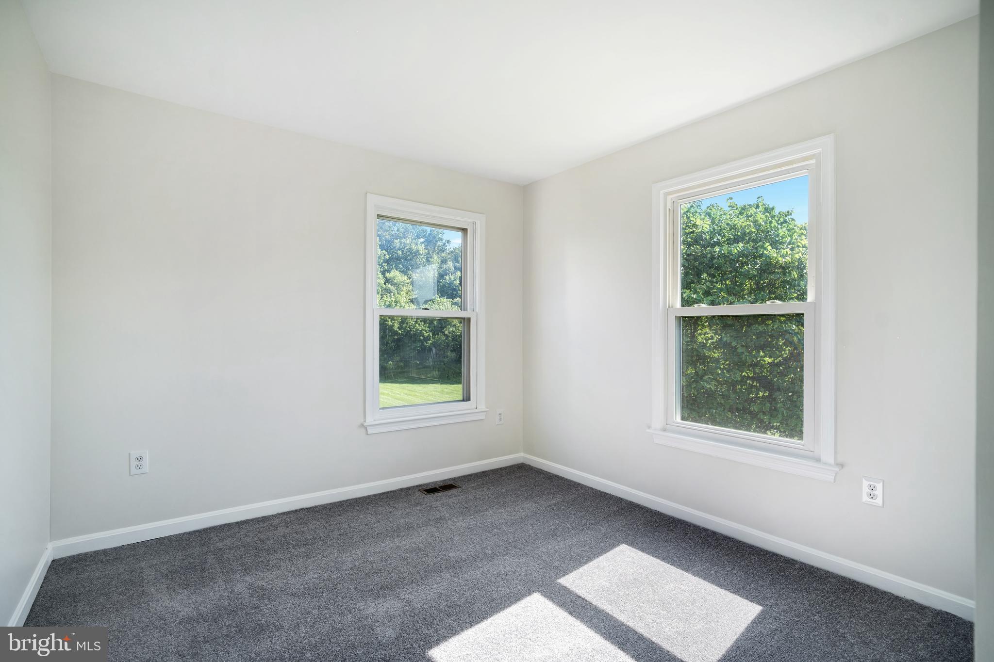 9448 Trevino Terrace, Unit 96 Laurel, MD 20708 - Photo 18 of 38 an empty room with a window