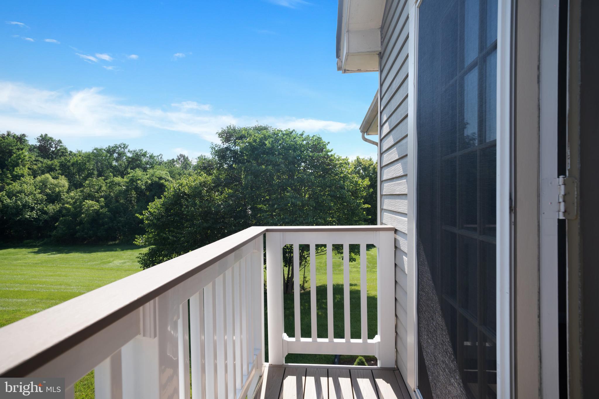 9448 Trevino Terrace, Unit 96 Laurel, MD 20708 - Photo 24 of 38 a view of balcony with garden