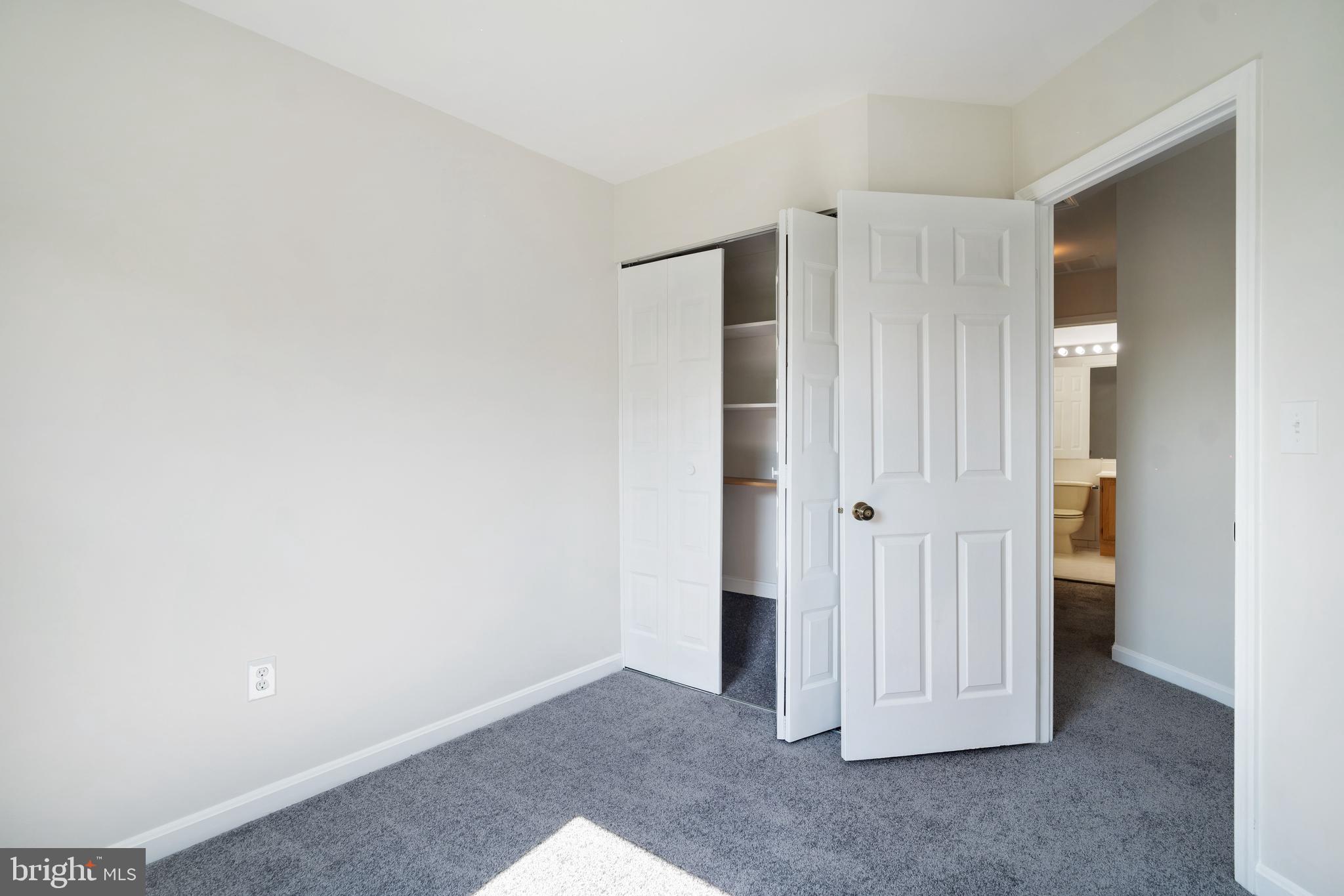 9448 Trevino Terrace, Unit 96 Laurel, MD 20708 - Photo 26 of 38 a view of an empty room