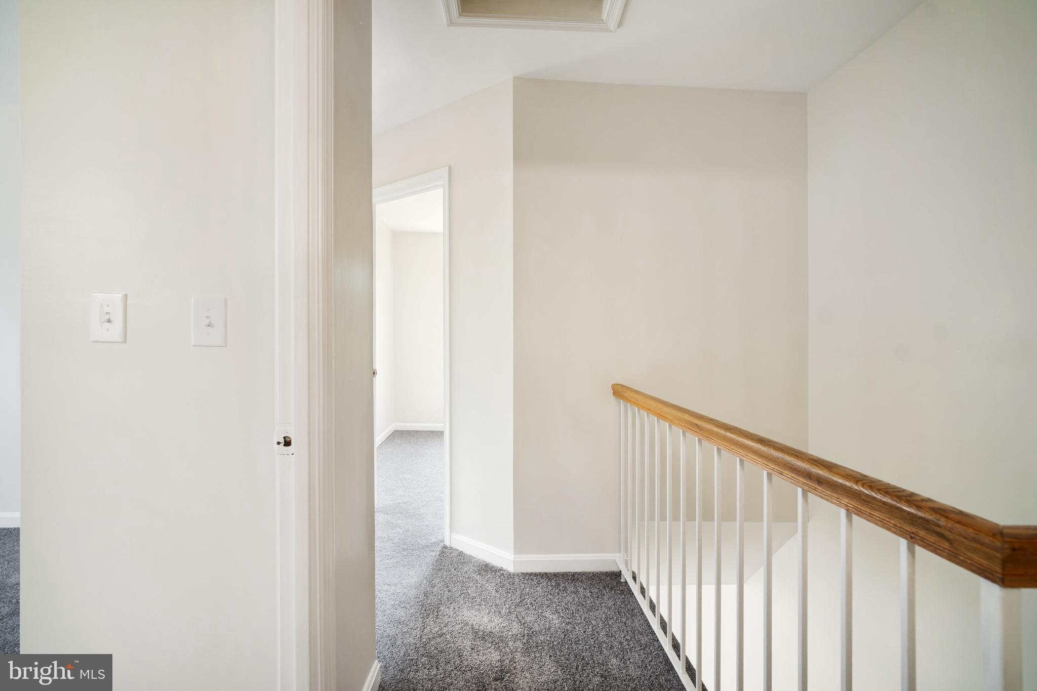 9448 Trevino Terrace, Unit 96 Laurel, MD 20708 - Photo 29 of 38 a view of a hallway