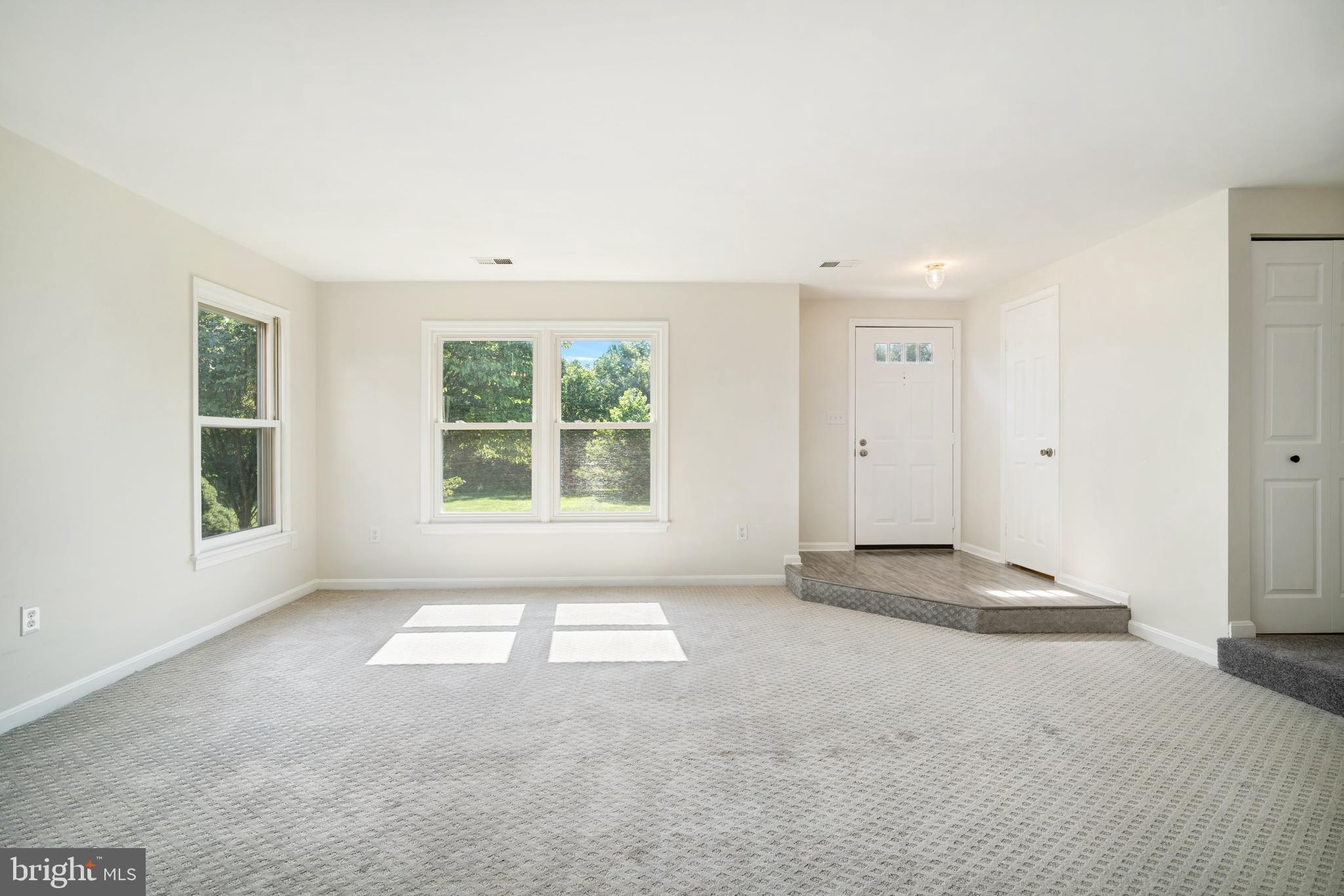 9448 Trevino Terrace, Unit 96 Laurel, MD 20708 - Photo 8 of 38 an empty room with windows