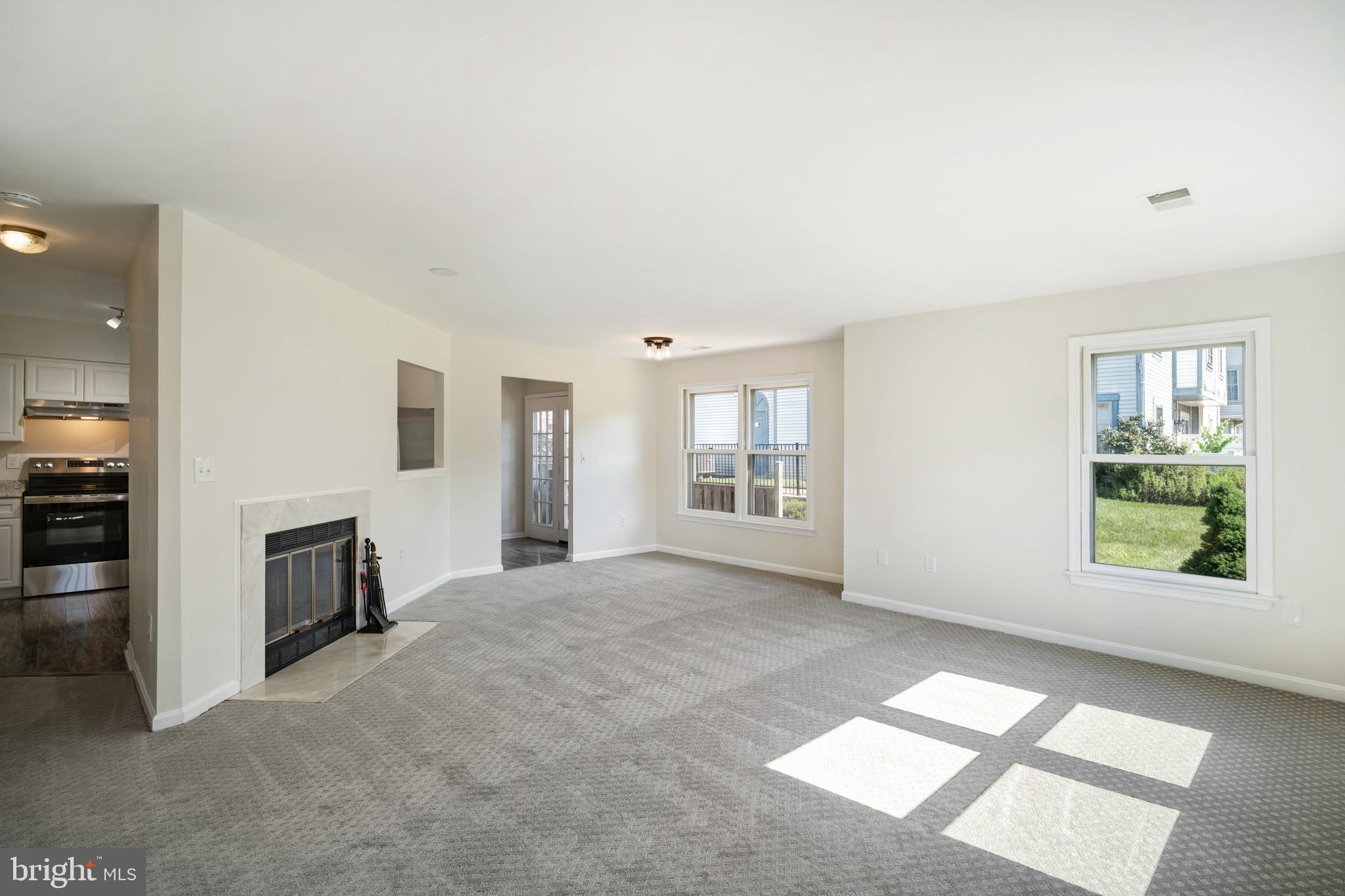 9448 Trevino Terrace, Unit 96 Laurel, MD 20708 - Photo 9 of 38 a view of an empty room with a window
