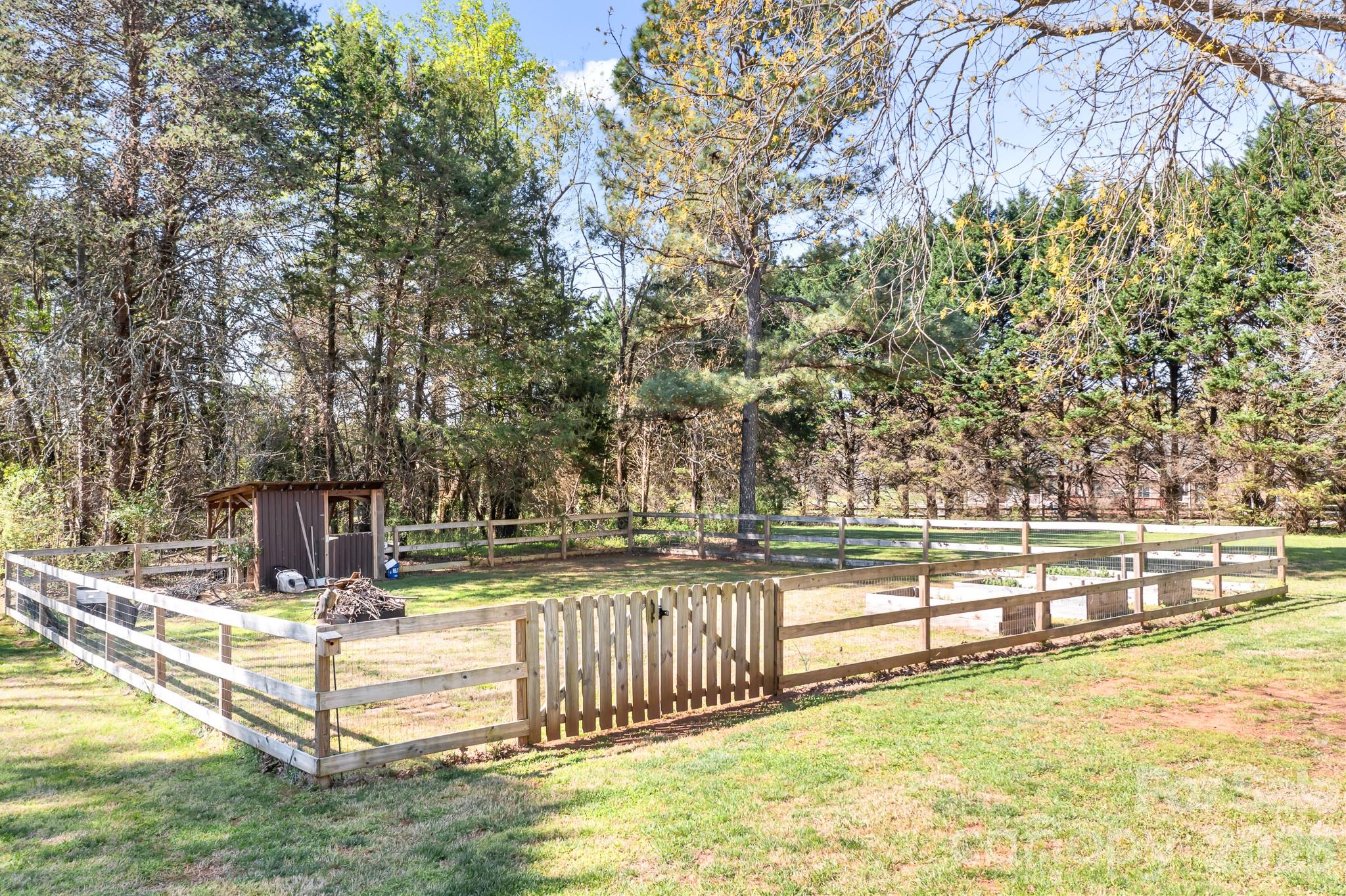 1315 Scotts Creek Road Statesville, NC 28625 - Photo 30 of 30 a view of a swimming pool with an outdoor seating