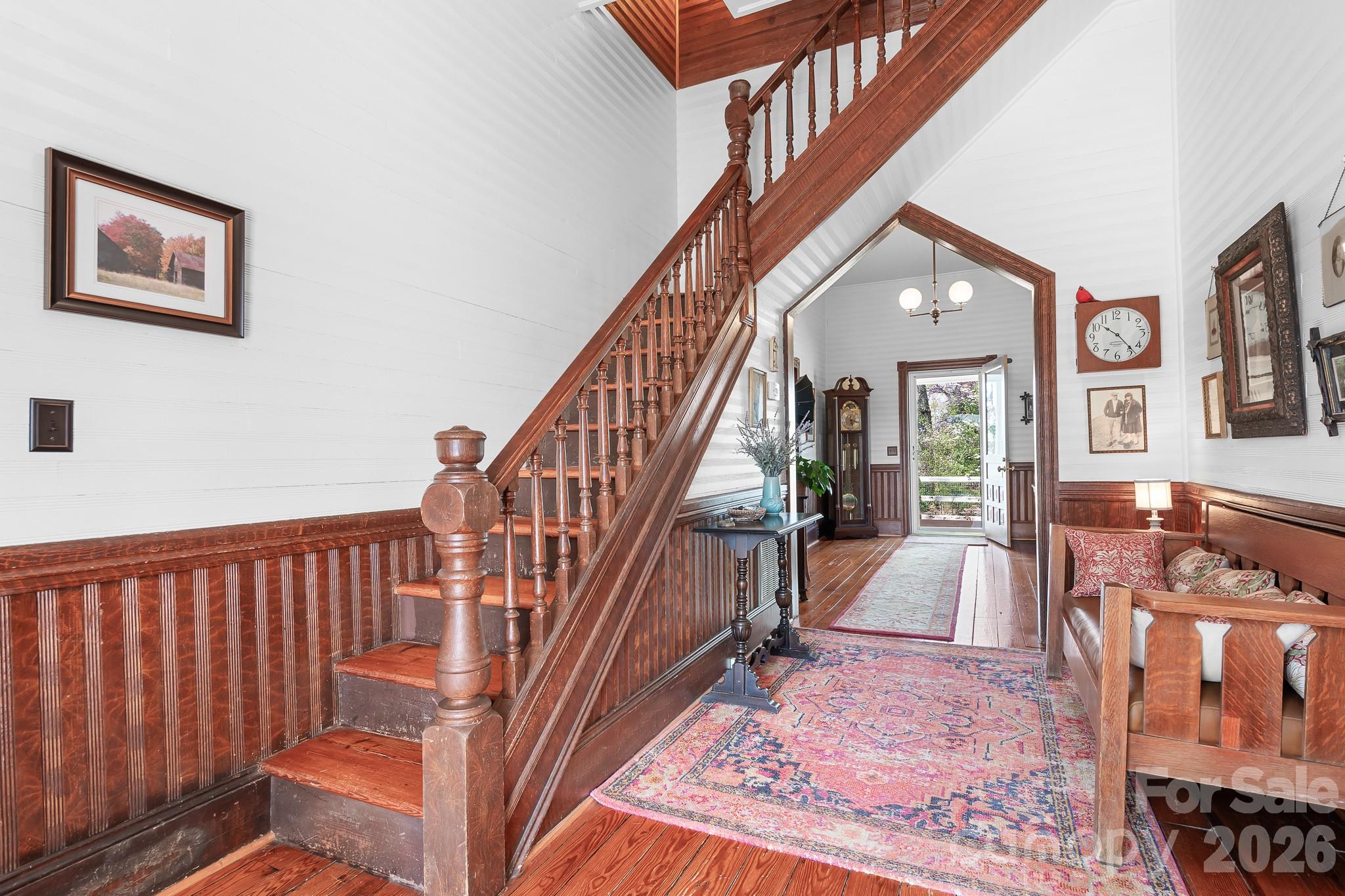 1315 Scotts Creek Road Statesville, NC 28625 - Photo 4 of 30 a view of staircase with furniture and a large window